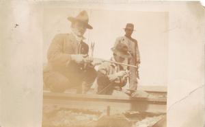 F21/ Interesting Photo RPPC Postcard c1910 Men Railroad Track Rifles 1