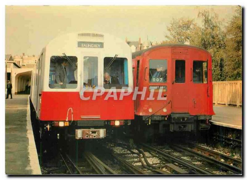 CPA Old and new District Line stock at Ealing Broadway 