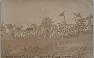 1910s Soldiers Marching to Rifle Ranges Guantanamo Cuba RPPC Photo Postcard