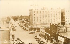 c1930 RPPC Postcard Street Scene La Grande OR Sacajawea Hotel Paint Store Bakery