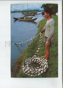 473245 South Vietnam Fisherman Quang Ngai pulls his nets Germany Postage Paid