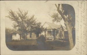 Hebron NE Cancel & Message - Home c1910 Real Photo Postcard