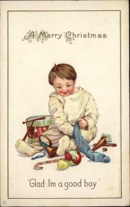 Christmas Little Boy Opens Stocking Toy Drum Stecher 315D c1910 Vintage Postcard