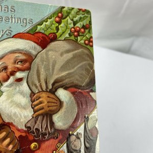 c.1915 Old Santa Claus Bell Toys Sack Bag Stockings Embossed Christmas Postcard
