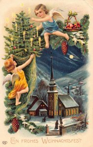 L364 Christmas Greetings 1910 Cherubs Tree over village vintage postcard