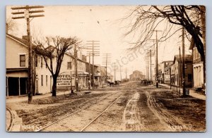 J87/ Hebron Newark Ohio RPPC Postcard c1910 Main Street Hotel Stores 907