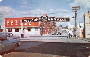 Ft Frances Ontario Canada welcome arch street scene vintage pc Y14311