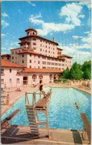 Colorado Springs Broadmoor Hotel  woman on diving board at pool     (11-5030)