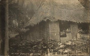 Luzon Philippines Thatch Roof Home Natives c1910 Real Photo Postcard