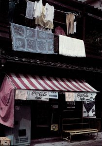 GROCERY STORE, SHIMODA, JAPAN, 1984 HAND COLORED & TONED GELATIN SILVER PRINT
