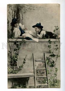 240091 Charming Kids on Fence GARDEN Vintage 1906 year RPPC