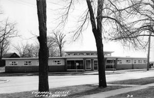 Clear Lake Iowa~Chappell Clinic~Lady on Sidewalk~Bare Trees~1950s RPPC-Postcard