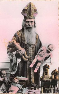 CHRISTMAS HOLIDAY SANTA CLAUS DOLL BABY BELGIUM STUDIO REAL PHOTO POSTCARD 1930s