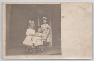 RPPC Clark Fork ID Darling Kids on Porch Potter Family 1910 Photo Postcard J24