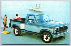Automobile~Free-Wheeling Fords Pickup On Beach Color Photo~Vintage Postcard