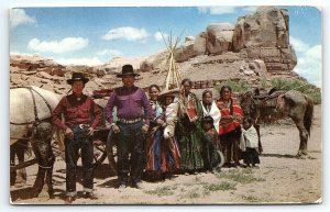 1956 SANTA FE NEW MEXICO NAVAJO FAMILY ON THE RESERVATION POSTCARD P3554