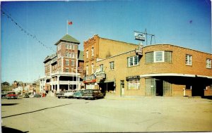 Postcard ON Kenora Main Street Hotel Household Finance Loans Bus Depot 1950s S97