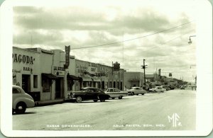 RPPC Business District Aqua Prieta Sonora Mexico Real Photo Postcard old cars
