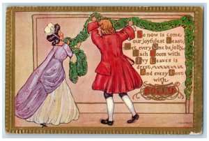 1912 Christmas Couple Decorating Holly Berries Garland Manchester NH Postcard