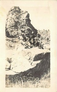 1910s RPPC Real Photo Postcard Hiking Climbers Explorers Rock Formation Hat Boot