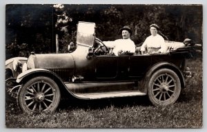 RPPC Early Automobile Man Showing His Automobile Woman in Back Seat Postcard F29