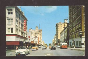 ST. PETERSBURG FLORIDA DOWNTOWN STREED SCENE OLD CARS STORES VINTAGE POSTCARD