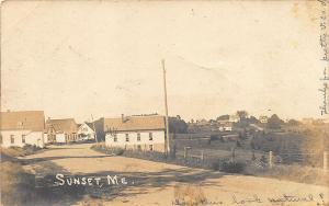 Sunset ME Down Town Dirt Street 1907 RPPC Postcard