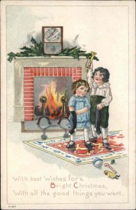 Christmas Little Boy and Girl Stockings Fireplace c1910 Vintage Postcard
