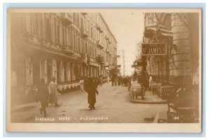 c1920's Sidewalk Cafes The St. James Sign Alexandria Egypt RPPC Photo Postcard