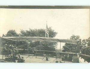 Pre-1917 rppc Patriotic USA FLAG FLYING OVER COVERED AREA W5108