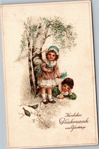 Boy and girl by tree watching birds - Happy Birthday german