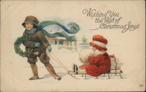 Christmas Boy Pulls Little Girl in Sled Children's Winter Fashion c1910 Postcard