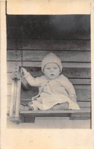 D88/ Interesting RPPC Real Photo Postcard c20s Child on Porch Swing Beautiful 16