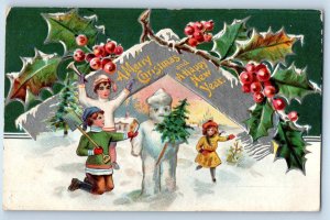 1909 Christmas New Year Children And Snowman Holly Berries Winter Scene Postcard