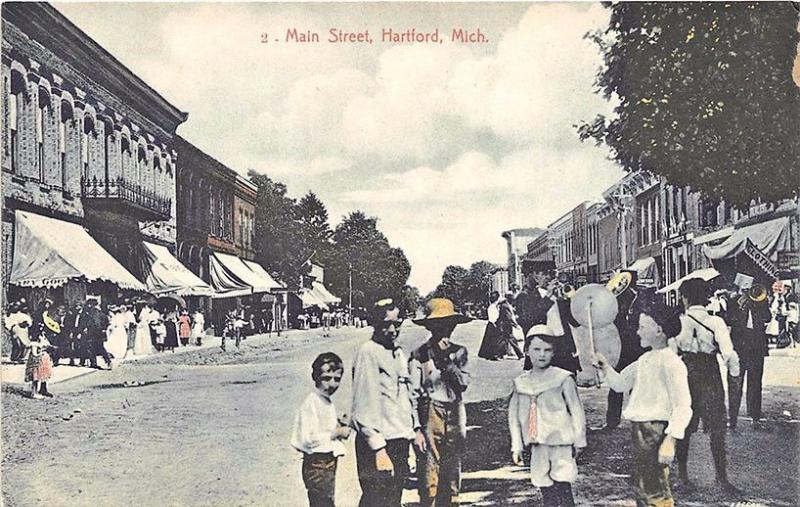 Hartford MI Main Street Store Fronts Children Postcard