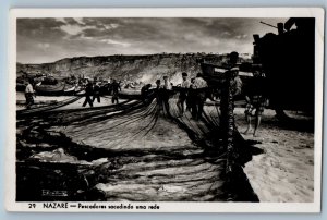 Nazare Portugal Postcard Fishermen shaking a net c1930's Vintage RPPC Photo