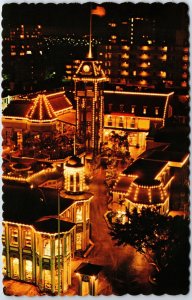 VINTAGE POSTCARD NIGHT SCENE AT KING'S ALLEY IN WAIKIKI HAWAII 1970s