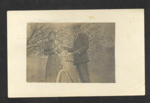 RPPC BLUEFIELD WEST VIRGINIA GIRL WITH DOLL VINTAGE BICYCLE REAL PHOTO POSTCARD