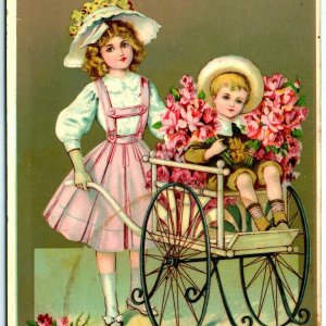 1913 Best Wishes Gel Girl Push Little Boy Flower Wood Cart Postcard Cute Vtg A18