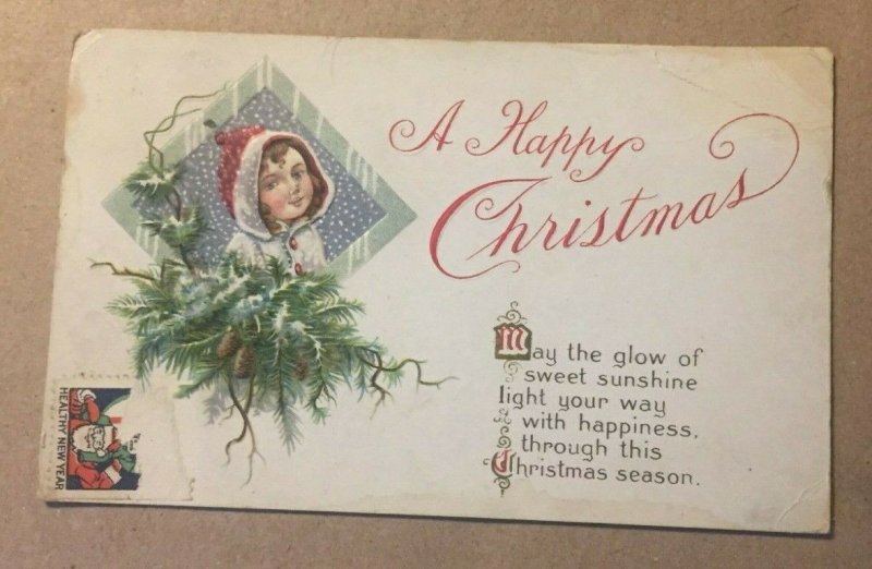 VINTAGE 1920 USED PENNY POSTCARD A HAPPY CHRISTMAS EMBOSSED