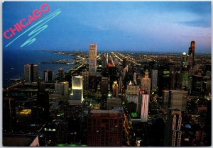 VINTAGE CONTINENTAL SIZE POSTCARD NIGHT VIEW OF THE JOHN HANCOCK CENTER CHICAGO