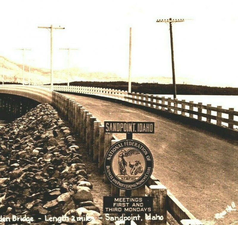 RPPC Sandpoint Idaho ID World's Longest All-Wooden Bridge NFBP Sign Postcard