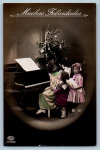 c1910's Christmas Children Piano RPPC Photo Posted Antique Postcard