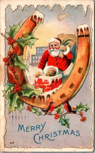 1909 PC Giant Horseshoe Around Santa Claus Climbing Down Chimney Birds Holly