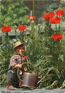 Funny pipe smocking puppet gardening flowers comic postcard