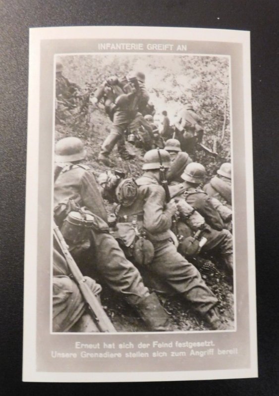 Mint German WWII Infantry RPPC Infanterie Greift An Soldiers leaning on Hill