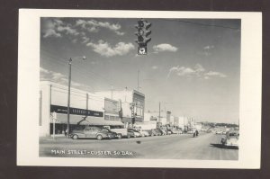 RPPC CUSTER SOUTH DAKOTA DOWNTOWN MAIN STREET OLD CARS REAL PHOTO POSTCARD