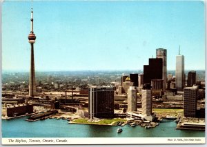 VINTAGE CONTINENTAL SIZE POSTCARD SKYLINE VIEW OF THE TORONTO LAKEFRONT AREA