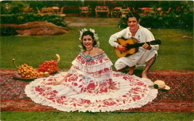 Beautiful young lady wearing the colorful national costume Pollera Panama