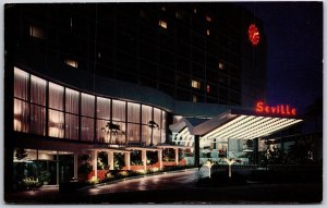 1961 Seville Hotel at Night Miami Beach Florida FL Coffee Shop Posted Postcard